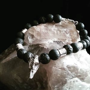 Sterling silver raven head and lava bead bracelet